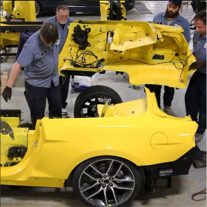 Ford technicians prepare the 2015 Mustang for the Empire State Building elevator.